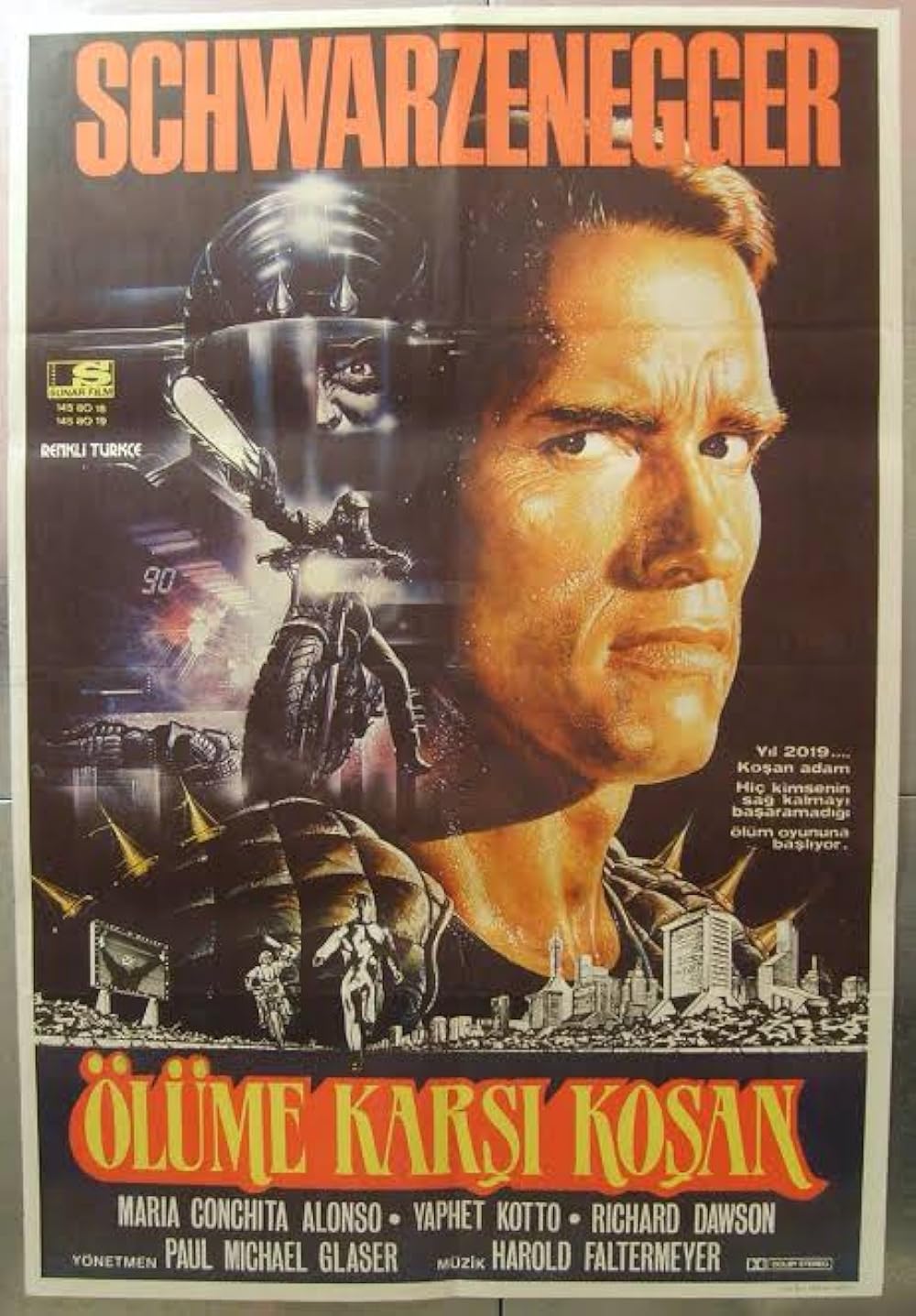 The Running Man (1987) 192Kbps 23.976Fps 48Khz 2.0Ch DigitalTV Turkish Audio TAC